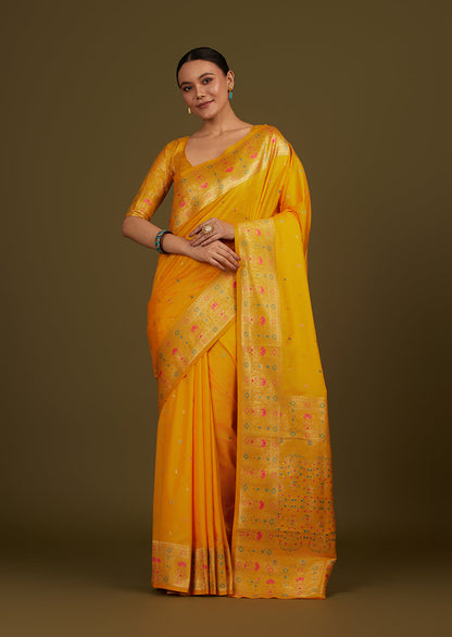 Monjolika Fashion Elegant Yellow Banarasi Silk Blend SareeBrocade Motifs & Zari Woven Splendor