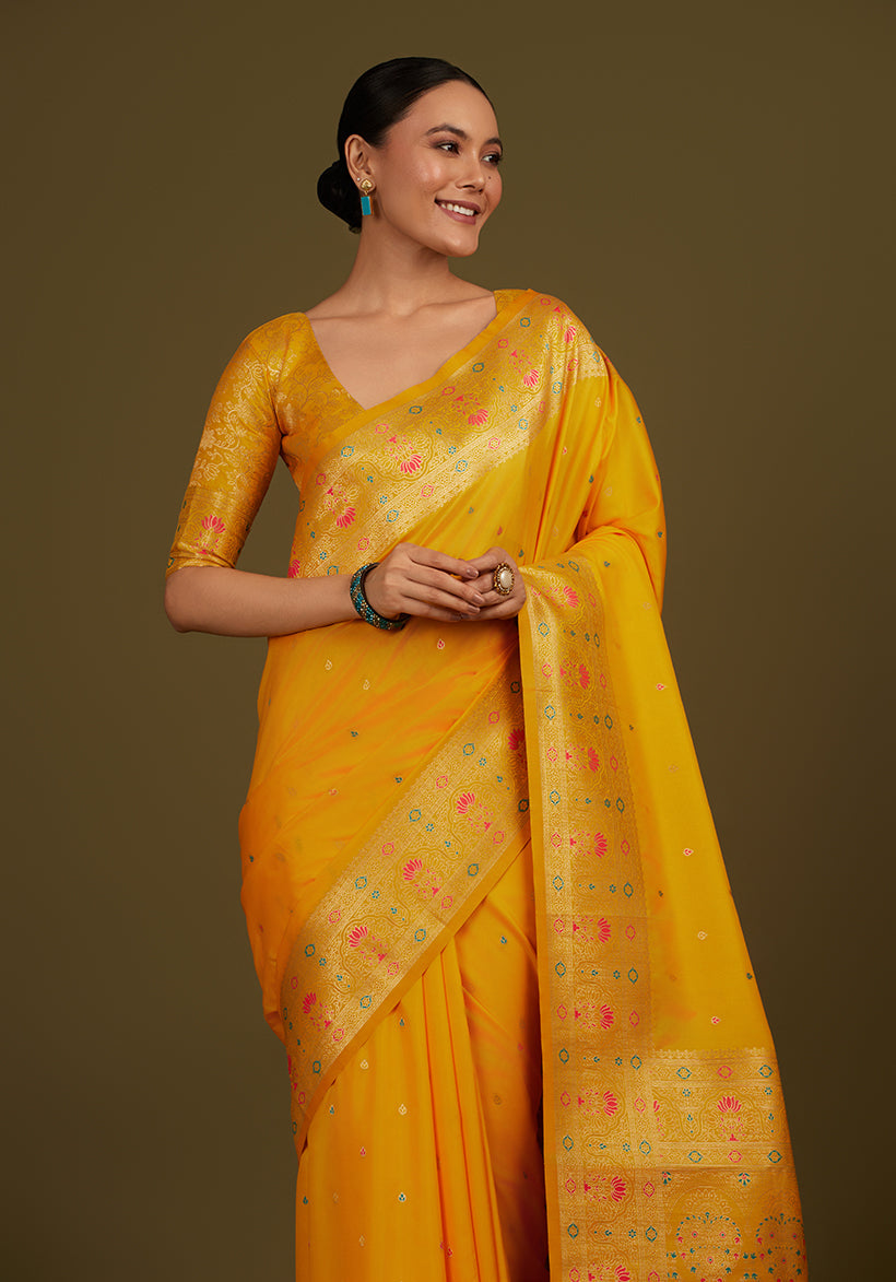 Monjolika Fashion Elegant Yellow Banarasi Silk Blend SareeBrocade Motifs & Zari Woven Splendor