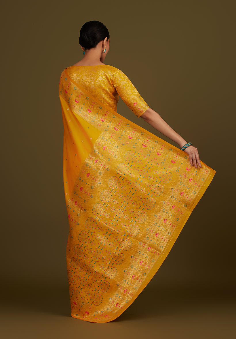 Monjolika Fashion Elegant Yellow Banarasi Silk Blend SareeBrocade Motifs & Zari Woven Splendor