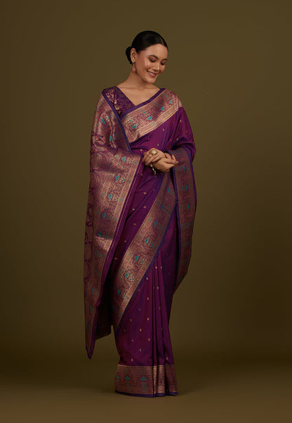 Monjolika Fashion Elegant Dark Purple Banarasi Silk Blend SareeBrocade Motifs & Zari Woven Splendor