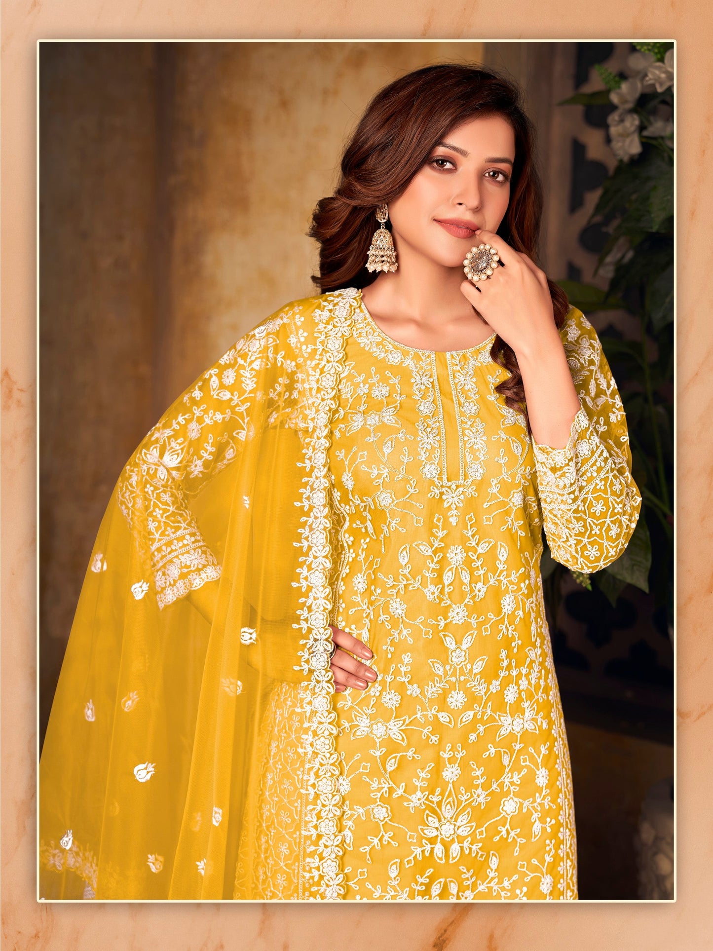 Anaita Yellow Embroidered Net Plazzo Suit