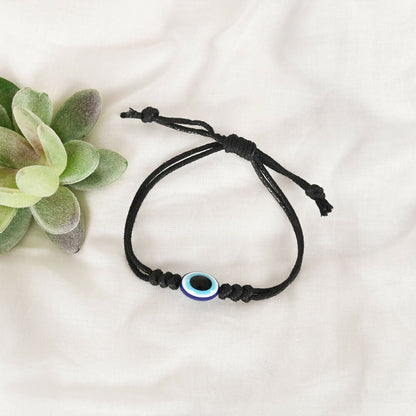 NVR Women & Men Black Evil Eye Rakhi With Roli Chawal
