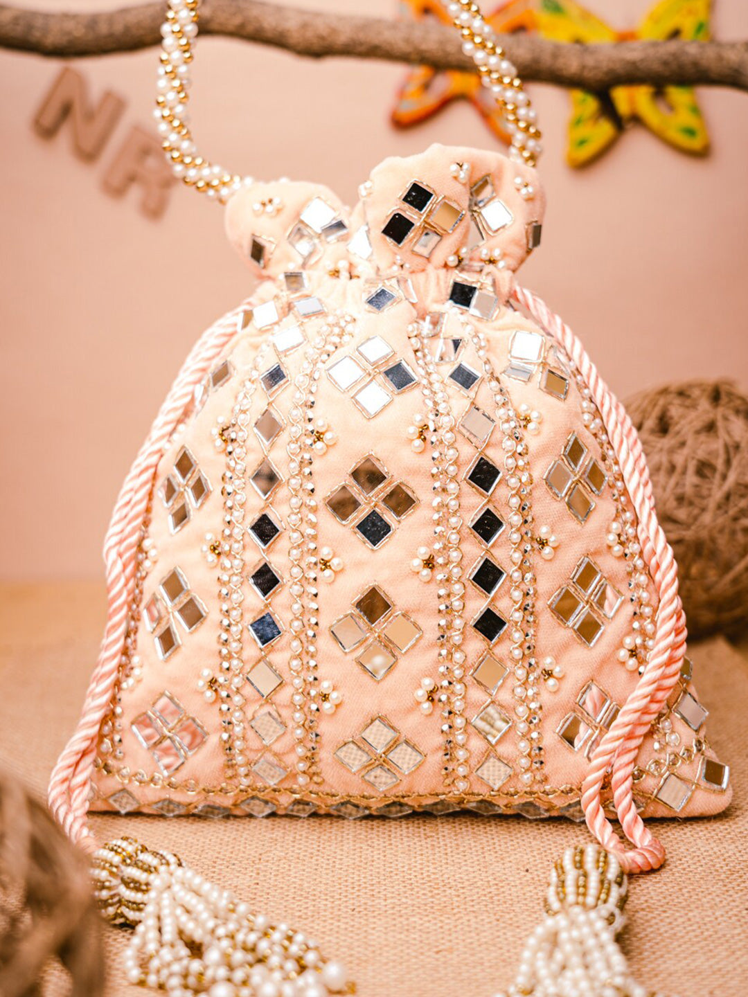 NR By Nidhi Rathi Peach-Coloured & White Embroidered Potli Clutch