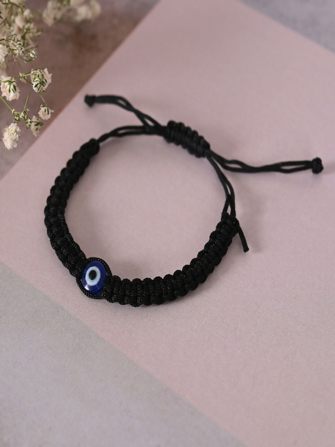 NVR Women & Men Black Evil Eye Rakhi With Roli Chawal