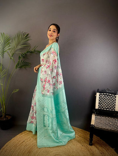 Elora Cyan Blue Silk Floral Motifs Coppery Tone Contrast Floral Border Banarasi Saree