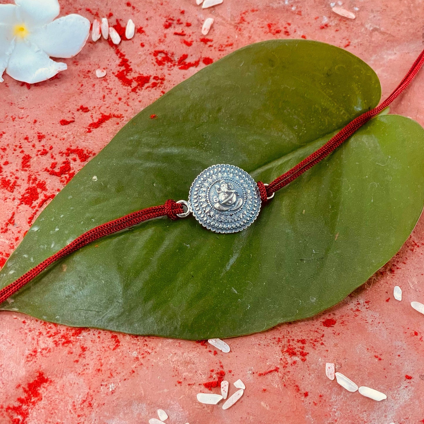 trueBrowns 925 Sterling Silver Embossed Ganesh Idol Thread Rakhi