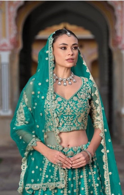Anaita Turquoise Net Lehenga Choli With Stone Embroidery Work