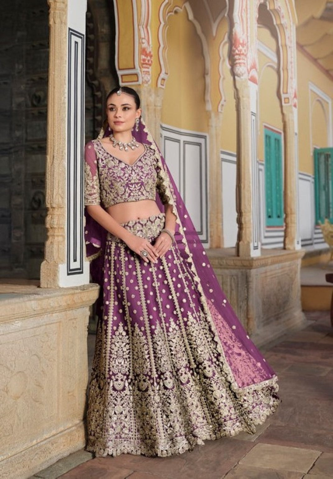 Anaita Purple Net Lehenga Choli With Stone Embroidery Work