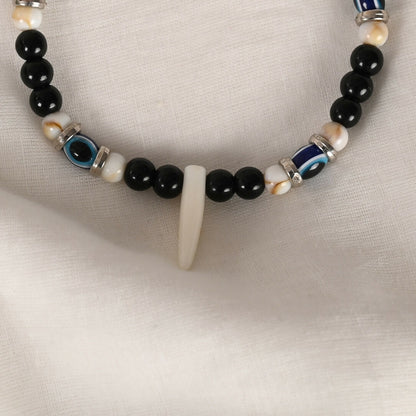 NVR Women & Men Black Evil Eye Rakhi With Roli Chawal