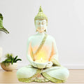 Jaipur Ace Buddha Sitting With Tea Light in Hand Polyresin Idol Buddha With Tea light
