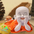 Mariner's Creation Polyresin Cute Baby Monk Laughing Buddha Showpiece Orange