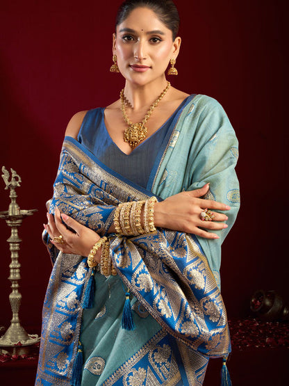Monjolika Fashion Light Blue Soft Banarasi Silk Blend Zari Woven Saree With Blouse Piece