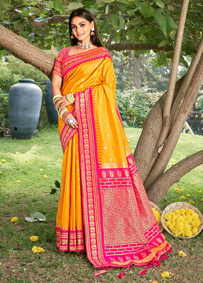 Monjolika Fashion Mustard & Rani Pink Banarasi Silk Blend Saree with Zari Woven Border