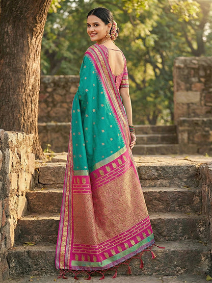 Monjolika Fashion Sea Green Banarasi Silk Blend Saree with Magenta Pink Zari Border