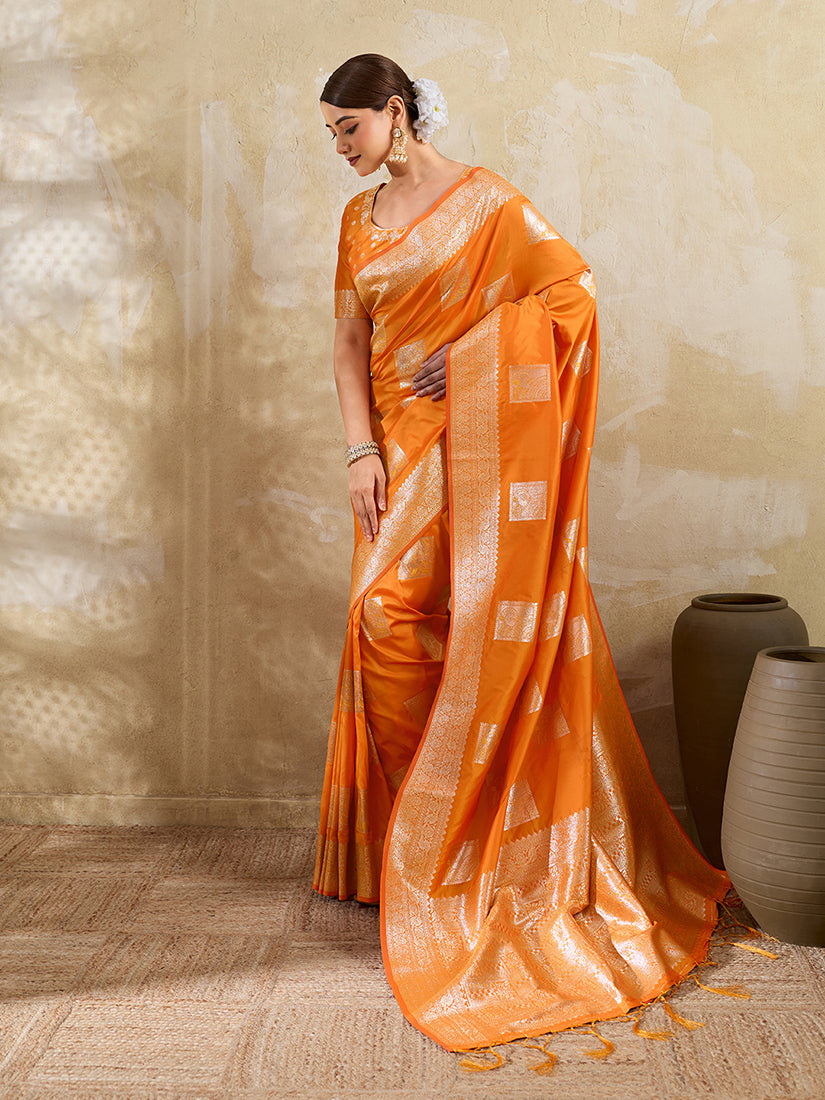 Monjolika Fashion Orange Zari Woven Banarasi Silk Blend Saree With Blouse Piece