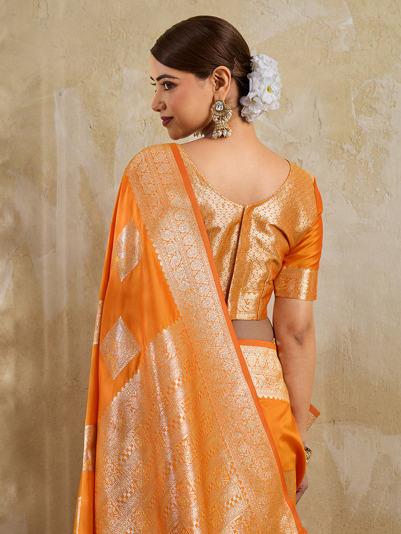 Monjolika Fashion Orange Zari Woven Banarasi Silk Blend Saree With Blouse Piece