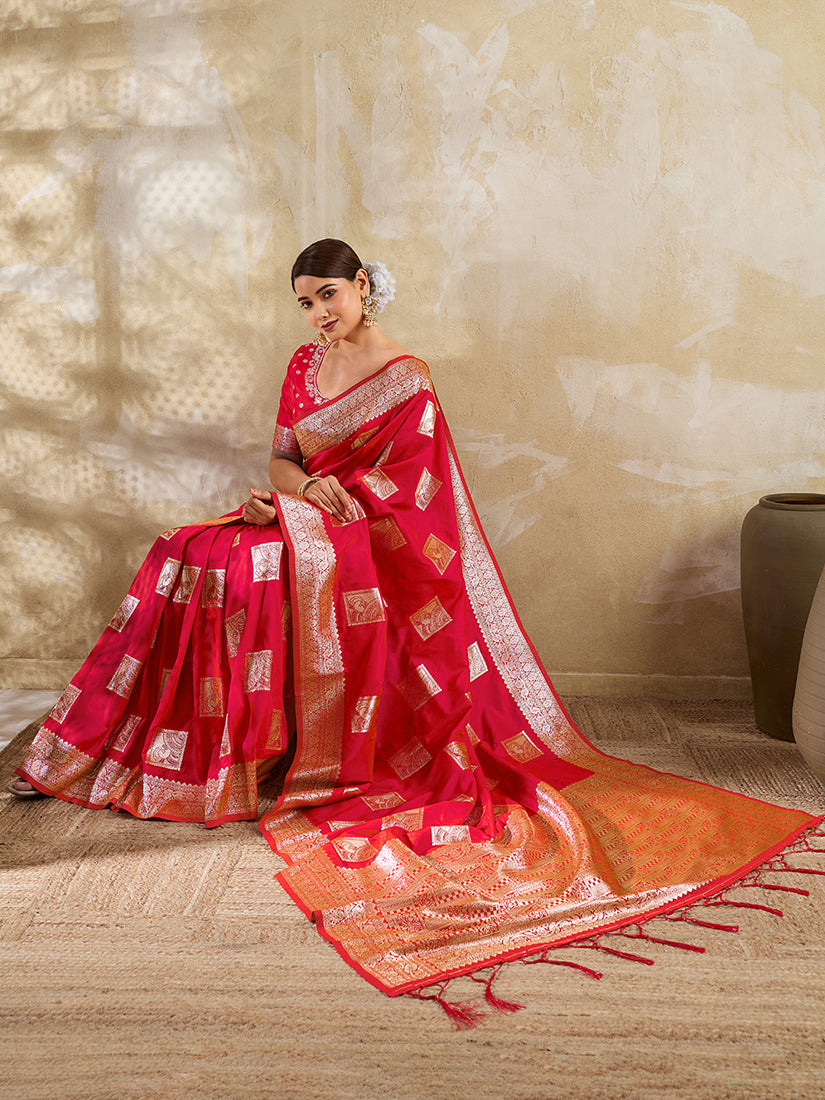 Monjolika Fashion Red Zari Woven Banarasi Silk Blend Saree With Blouse Piece