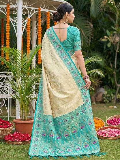 Monjolika Fashion Cream Banarasi Silk Blend Saree with Aqua Blue Zari Woven Border