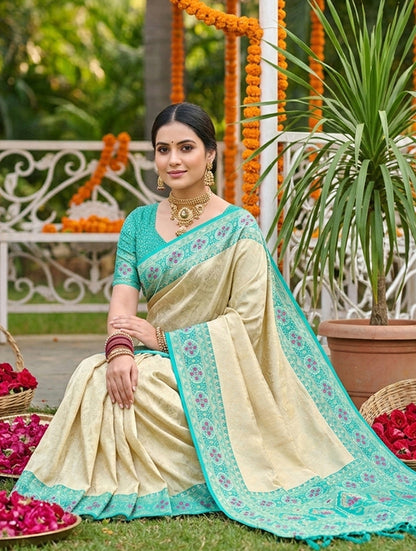 Monjolika Fashion Cream Banarasi Silk Blend Saree with Aqua Blue Zari Woven Border