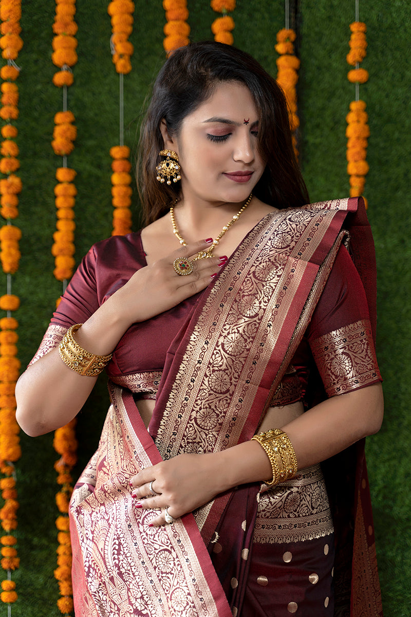 Monjolika Fashion Maroon Woven Banarasi Silk Blend Saree With Blouse