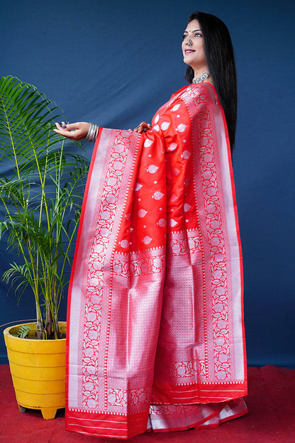 Monjolika Fashion Red Woven Banarasi Silk Blend Saree With Blouse