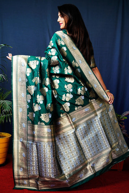 Monjolika Fashion Dark Green Woven Banarasi Silk Blend Saree With Blouse