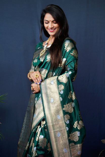 Monjolika Fashion Dark Green Woven Banarasi Silk Blend Saree With Blouse