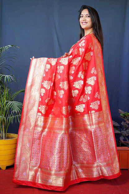 Monjolika Fashion Red Woven Banarasi Silk Blend Saree With Blouse