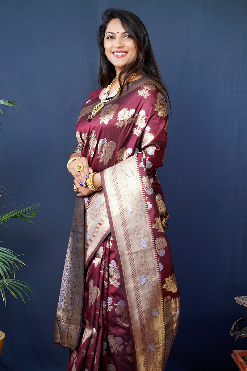 Monjolika Fashion Maroon Woven Banarasi Silk Blend Saree With Blouse