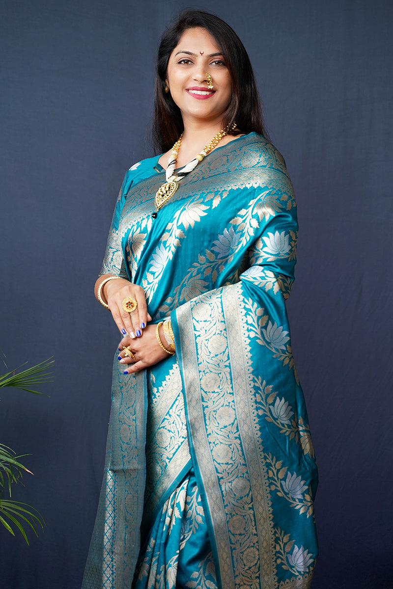 Monjolika Fashion Teal Blue Woven Banarasi Silk Blend Saree With Blouse