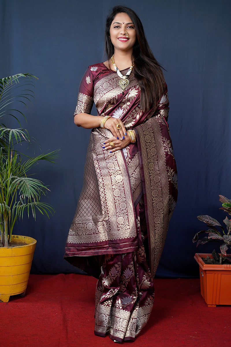 Monjolika Fashion maroon Woven Banarasi Silk Blend Saree With Blouse