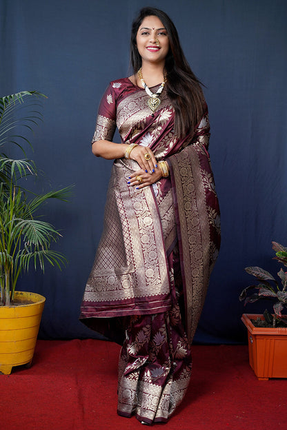 Monjolika Fashion maroon Woven Banarasi Silk Blend Saree With Blouse