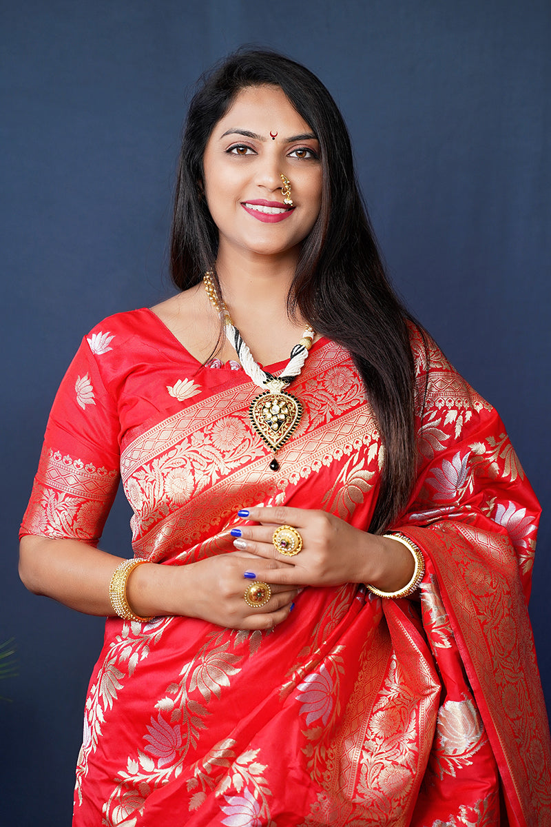 Monjolika Fashion Red Woven Banarasi Silk Blend Saree With Blouse