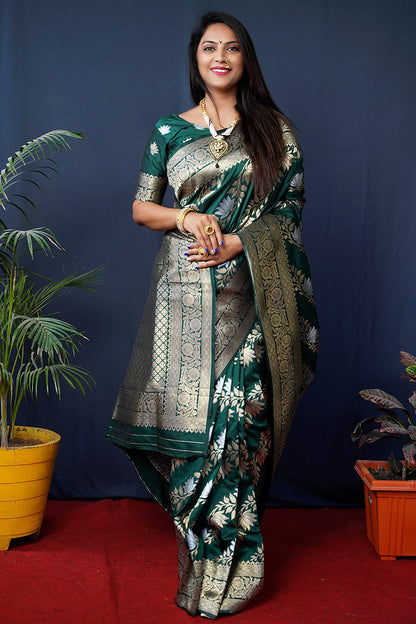 Monjolika Fashion Dark Green Woven Banarasi Silk Blend Saree With Blouse