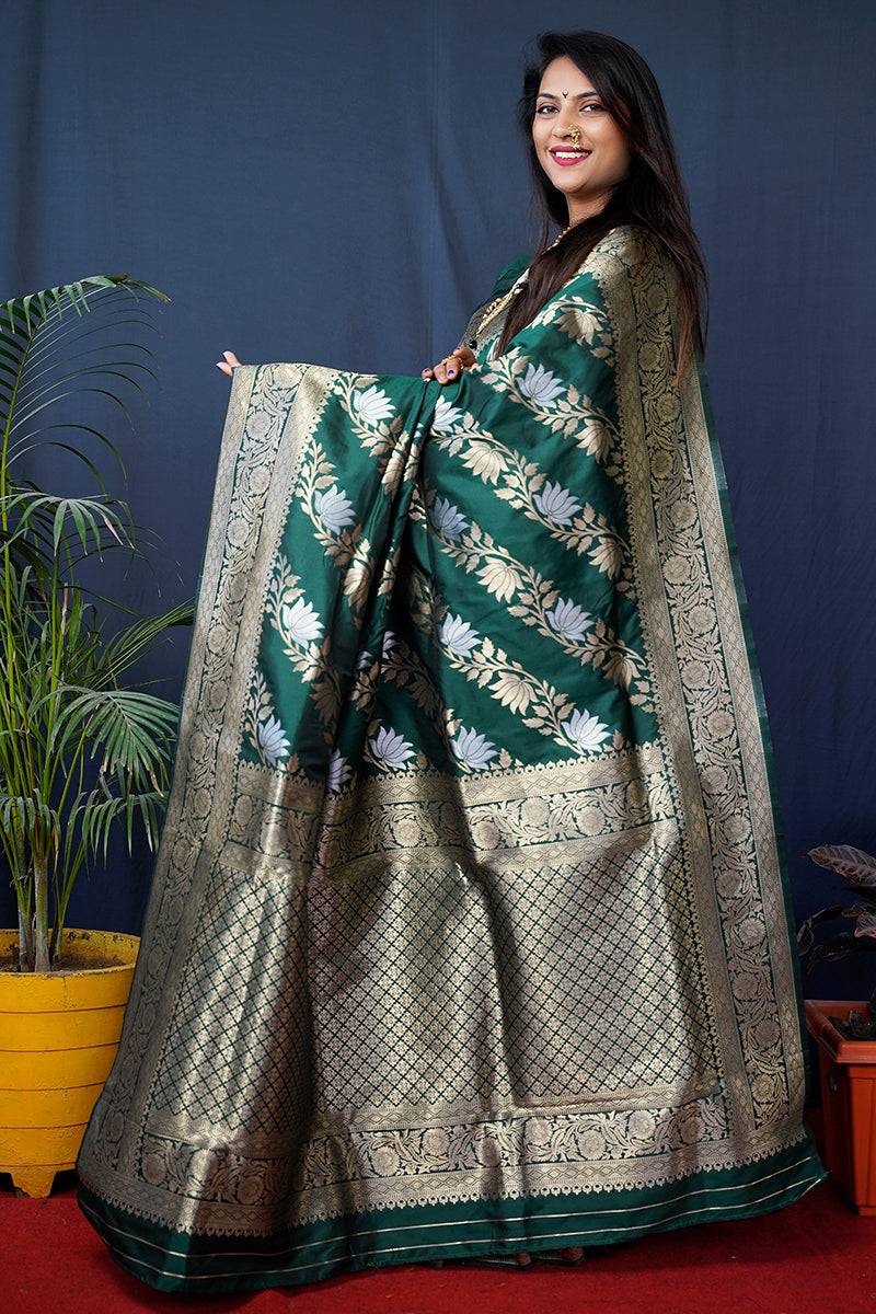 Monjolika Fashion Dark Green Woven Banarasi Silk Blend Saree With Blouse