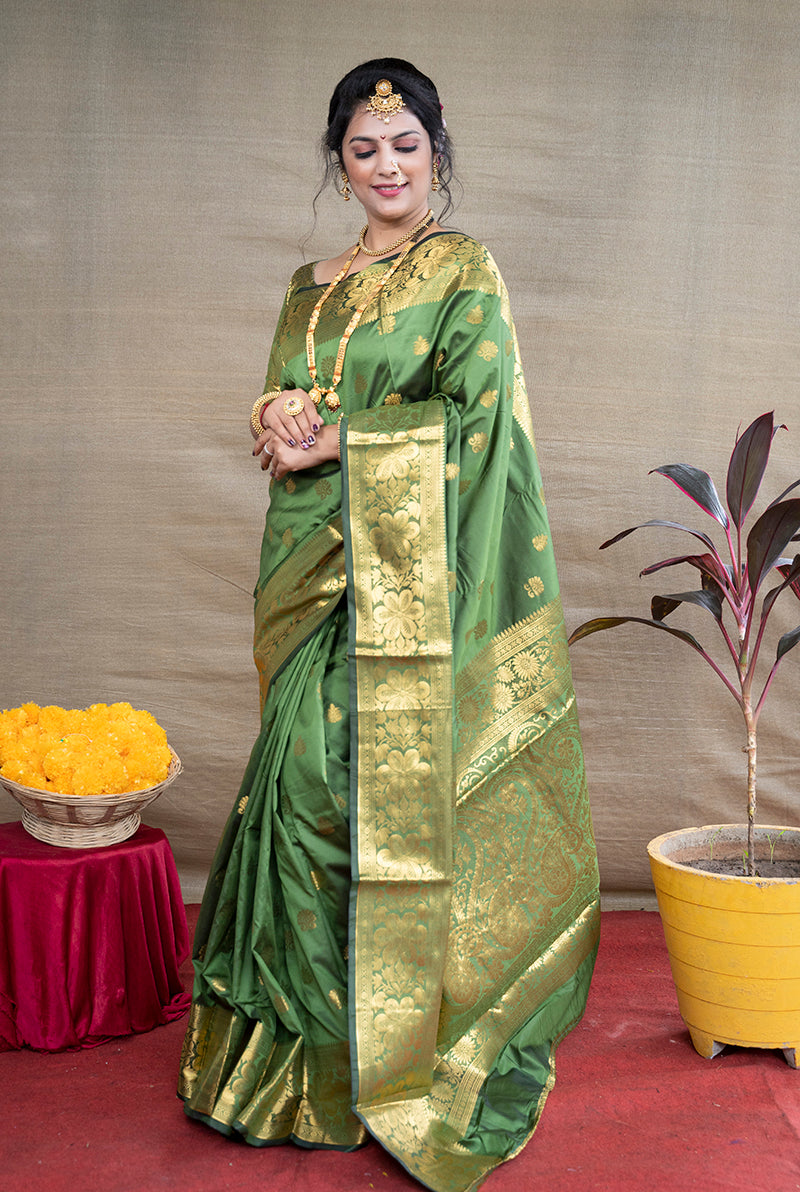 Monjolika Fashion Green Banarasi Silk Blend Saree With Golden Zari Work