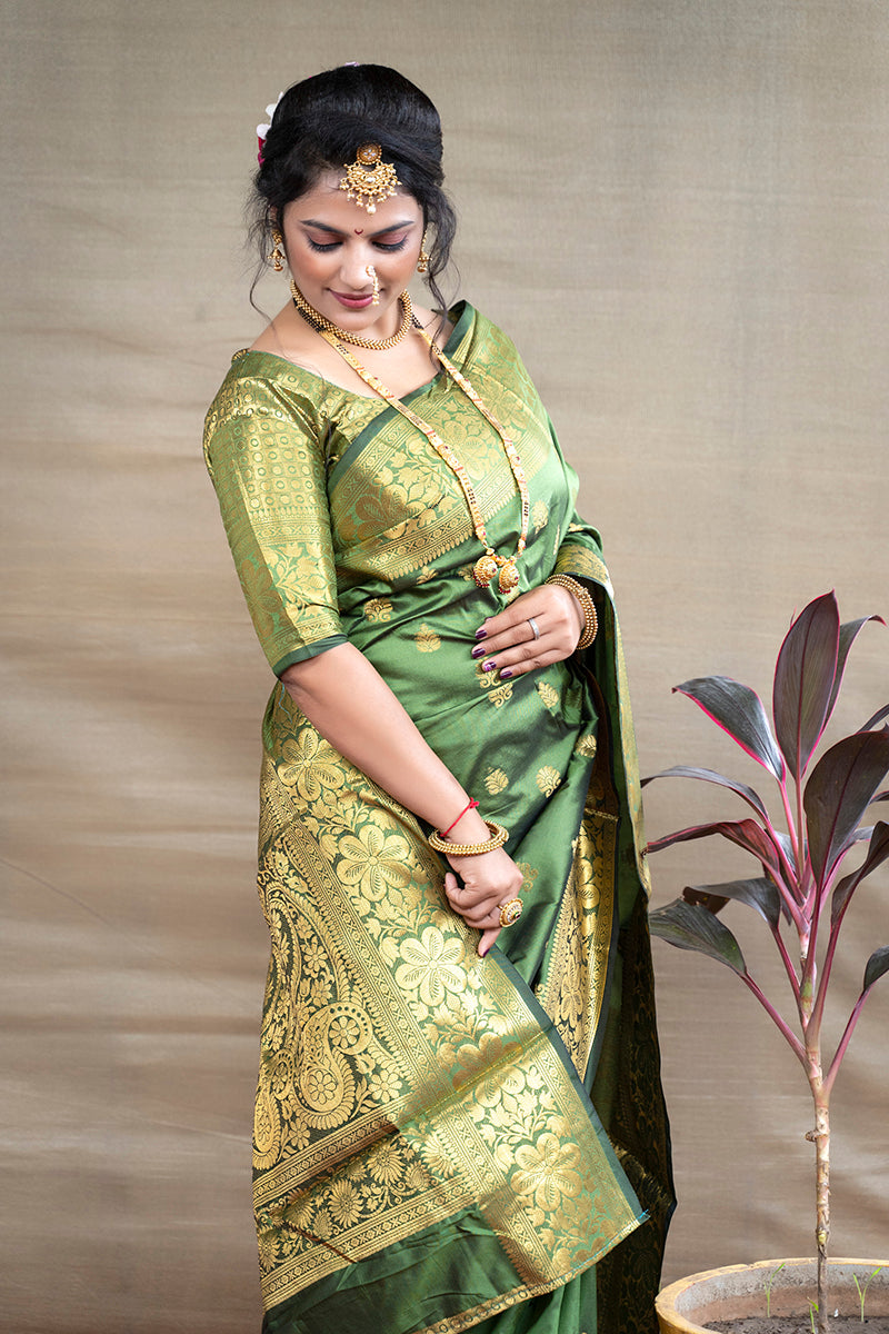Monjolika Fashion Green Banarasi Silk Blend Saree With Golden Zari Work