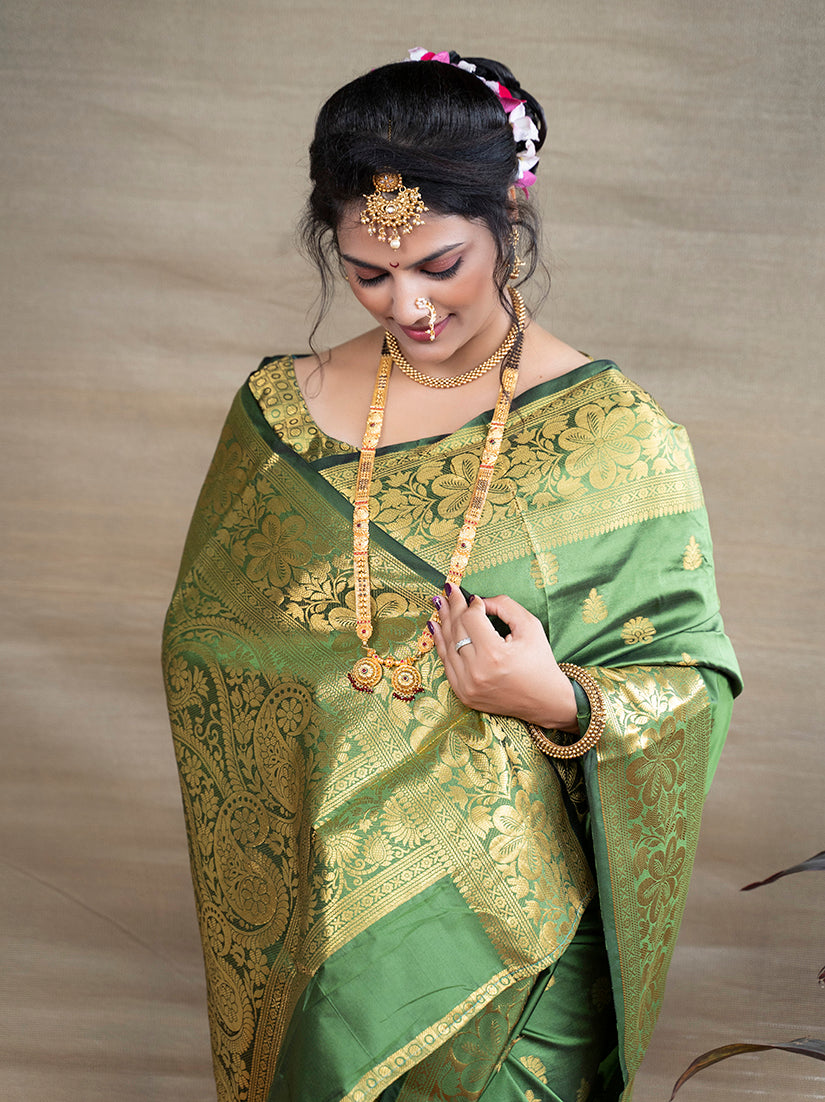 Monjolika Fashion Green Banarasi Silk Blend Saree With Golden Zari Work