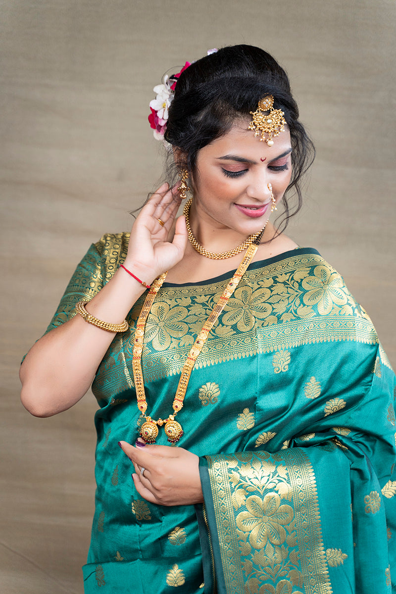 Monjolika Fashion Turquoise Banarasi Silk Blend Saree With Golden Zari Work
