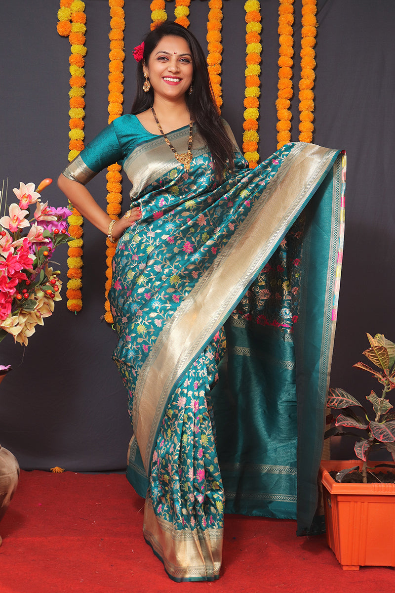 Monjolika Fashion Teal Blue Banarasi Silk Blend Saree With Floral Jaal & Zari Border