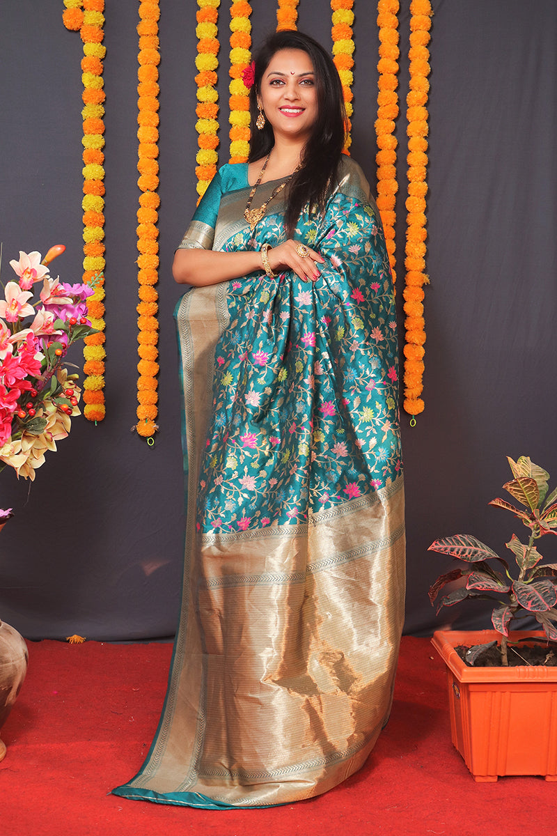 Monjolika Fashion Teal Blue Banarasi Silk Blend Saree With Floral Jaal & Zari Border