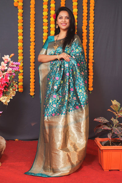 Monjolika Fashion Teal Blue Banarasi Silk Blend Saree With Floral Jaal & Zari Border