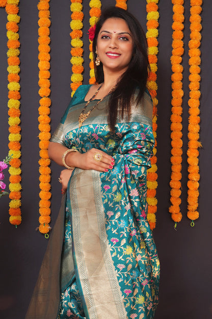 Monjolika Fashion Teal Blue Banarasi Silk Blend Saree With Floral Jaal & Zari Border