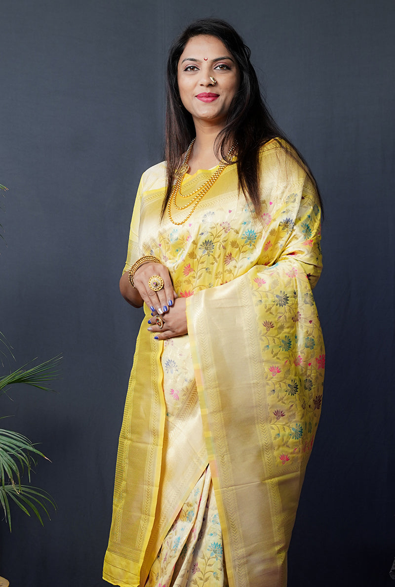 Monjolika Fashion Lemon Yellow Banarasi Silk Blend Saree With Floral Jaal & Zari Border