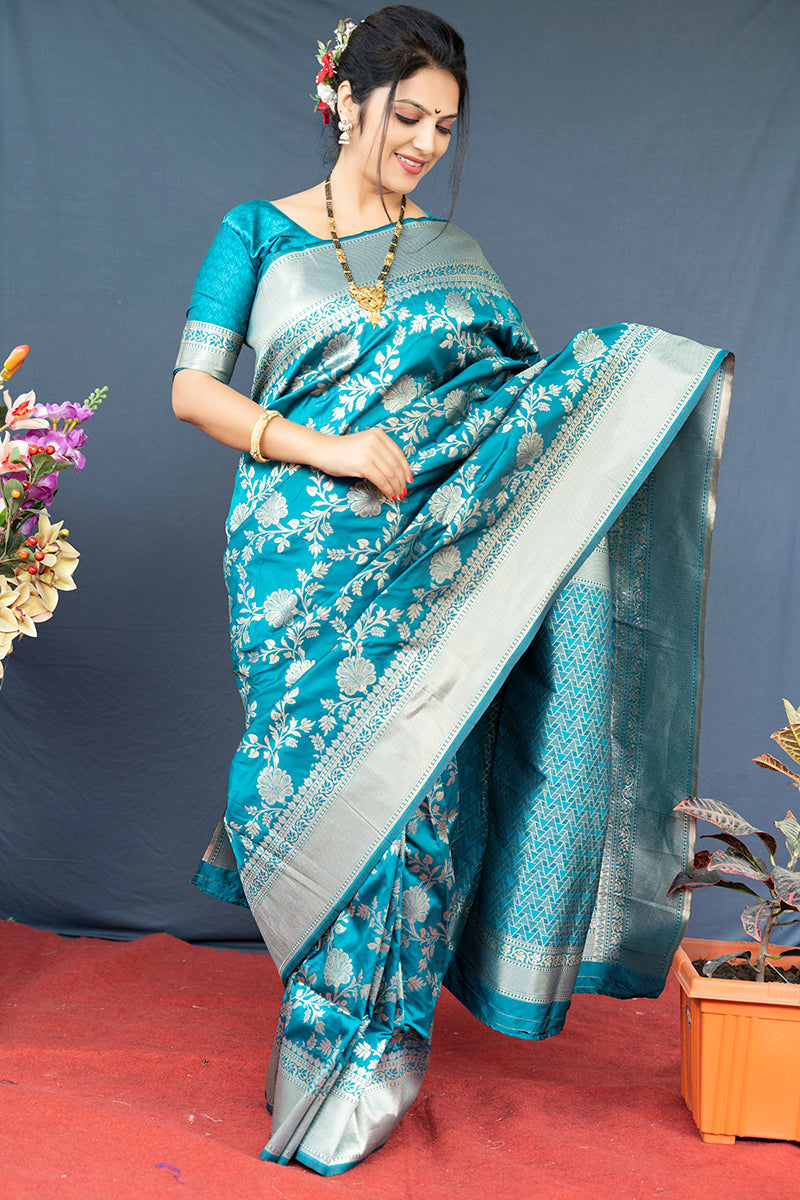 Monjolika Fashion Aqua Blue Banarasi Silk Blend Saree With Floral Zari Weaving
