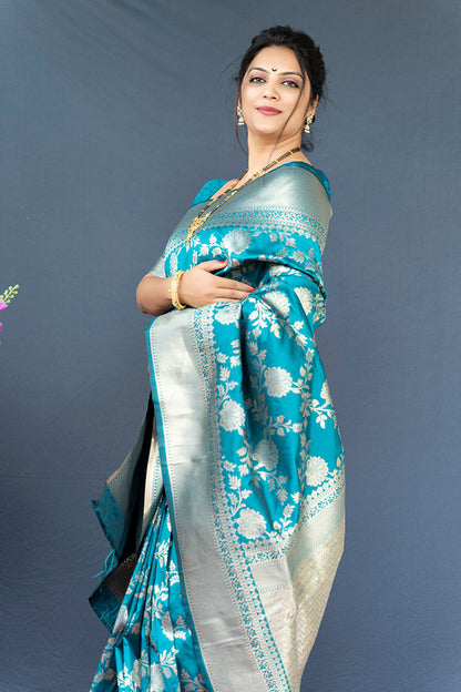 Monjolika Fashion Aqua Blue Banarasi Silk Blend Saree With Floral Zari Weaving