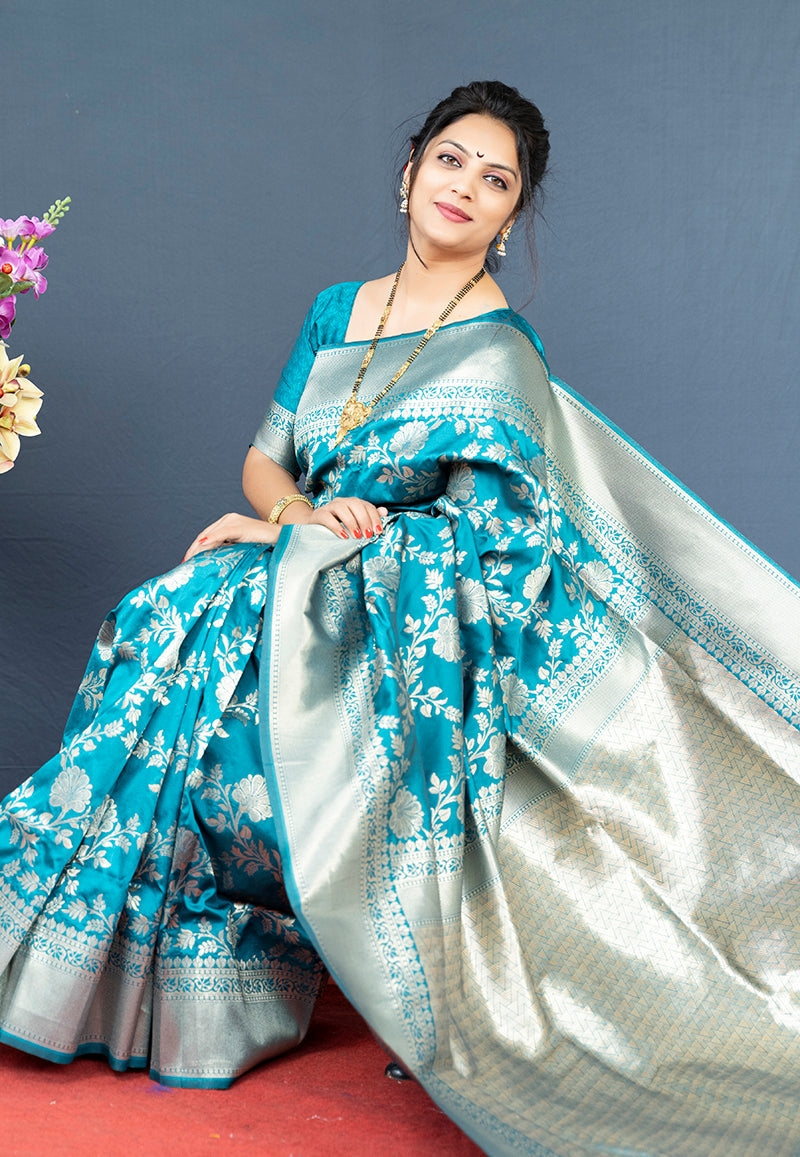 Monjolika Fashion Aqua Blue Banarasi Silk Blend Saree With Floral Zari Weaving