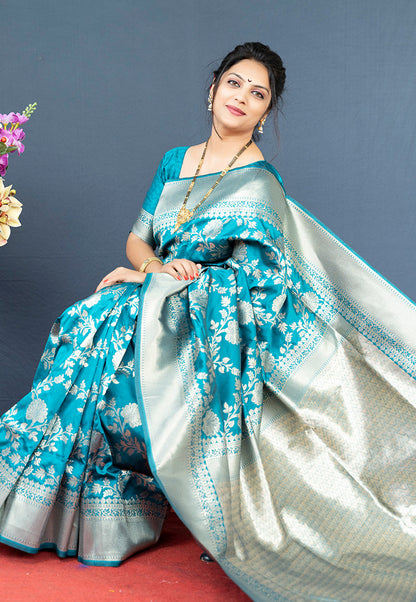 Monjolika Fashion Aqua Blue Banarasi Silk Blend Saree With Floral Zari Weaving