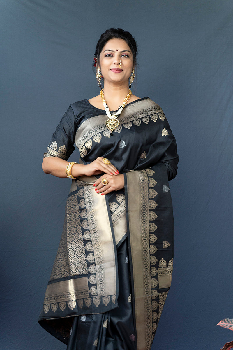 Monjolika Fashion Black Banarasi Silk Blend Saree with Silver Zari Border & Woven Pallu