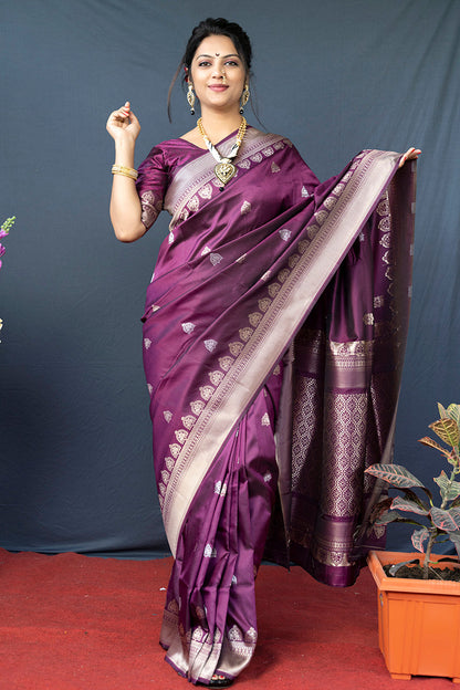 Monjolika Fashion Wine Purple Banarasi Silk Blend Saree with Silver Zari Border & Woven Pallu